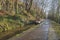 Narrowboat on a British canal in rural setting