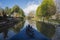 Narrowboat on a British canal in rural setting