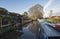 Narrowboat on a British canal in rural setting