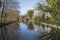 Narrowboat on a British canal in rural setting