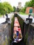 Narrowboat entering deep lock