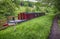 Narrowboat moored on a British canal in rural setting