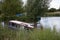 A narrowboat sails down The Thames near Farmoor in Oxfordshire in the UK