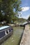 Narrowboat waiting for water to rise in a canal lock