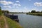Narrowboats moored on The Thames near Eynsham in Oxfordshire in the UK