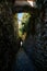 Narrowest stone lane in the Czech Republic, Katova ulicka or Executioner`s alley, street with only 66 cm wide, sunny day, Kadan,