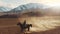 Naryn, Kirgizstan - April 4, 2019: A young boy rides a horse through a valley against the mountains. An aerial dynamic