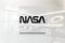 Nasa on glossy office wall realistic texture