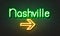 Nashville neon sign on brick wall background.