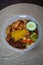 Nasi Ambeng or Nasi Ambang. It is a fragrant rice dish that consists of steamed white rice, chicken curry or chicken stewed in soy