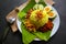 Nasi kuning or yellow rice or tumeric rice is traditional food from asia