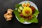 Nasi kuning or yellow rice or tumeric rice is traditional food from asia