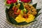 nasi kuning or yellow rice or tumeric rice is traditional food from asia, made rice cooked with turmeric, coconut milk and spices