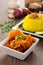 Nasi Kunyit also known as Turmeric Glutinous Rice. Normally eaten with dry curry chicken