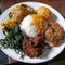 Nasi Padang Indonesian food on a plate.