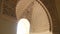 Nasrid arc in the interior of the ancient palace of the Alcazaba, Malaga, Spain