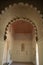 Nasrid arch in door in ancient muslim palace of Alcazaba, Malaga, Spain