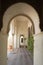 Nasrid arcs in the interior of the muslim palace of the Alcazaba, Malaga, Spain