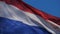 The national dutch flag waving in the wind.