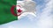 National flag of Algeria waving on a clear day