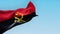 The national flag of Angola waving in the wind on a clear day