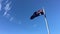 The national flag of Australia Against Blue Sky