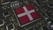 National flag of Denmark on the operating chipset. Danish information technology or hardware development related