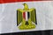 The national flag of Egypt, a tricolour consisting of the three equal horizontal red, white, and black bands, The flag bears Egypt