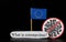 National flag of Europe union with cell of covid-19 and word coronavirus. Fast spreading disease worldwide. Covid-2019 is a