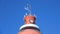 National flag of Finland on top of the old water tower. Hanko