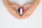 The national flag of France in female hands. The concept of patriotism, respect and solidarity with the citizens of France