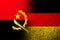The national flag of Germany with Republic of Angola national flag. Grunge background