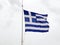 National flag of Greece waving on a mast in the wind