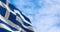 National flag of Greece waving in the wind on a clear day