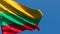 The national flag of Lithuania is flying in the wind