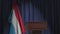 National flag of Luxembourg and speaker podium tribune. Political event or statement related conceptual 3D animation