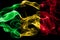 National flag of Mali made from colored smoke isolated on black background. Abstract silky wave background.