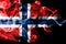 National flag of Norway made from colored smoke isolated on black background. Abstract silky wave background