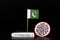 National flag of Pakistan union with cell of covid-19 and word coronavirus. Fast spreading disease worldwide. Covid-2019 is