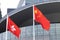 National flag of Peopleâ€™s republic of China and regional flag of Hong Kong Special Administrative region in front of Government