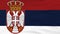 National flag of Serbia flying on the wind