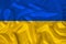 National flag of Ukraine on gentle silk with wind folds, travel concept, immigration, politics, close-up, copy space, illustration