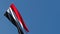 The national flag of Yemen flutters in the wind