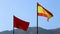 The national flags of Morocco and Spain waving with slow motion