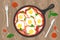 National food of Israel. Flat vector illustration. The view from the top. Shakshouka