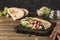 National Greek fast food pita with chicken and fresh vegetables on a wooden Board