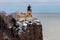 National Historic Landmark Split Rock Lighthouse and Fog Horn House during winter with snow on the North Shore of Lake Superior at