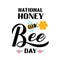 National Honey Bee Day calligraphy hand lettering with cute cartoon bee and honeycomb isolated on white. Easy to edit vector