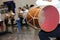 The national instrument of Azerbaijan nagara . children in national costumes play drums . Young azeri guys playing