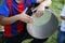 The national instrument of Azerbaijan nagara . children in national costumes play drums . Young azeri guys playing traditional